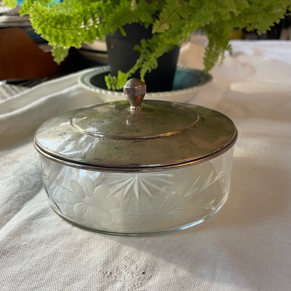 Sterling silver and etched glass with floral and vine design.
